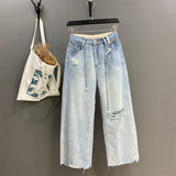 "Light blue thin ripped loose cut wide-leg jeans".