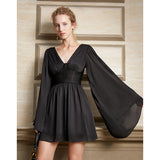 "Elegance in Motion Statement Cuff Dress"