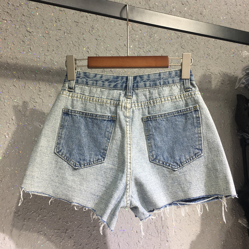 "Contrast Denim Shorts with label" high waist.