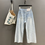 "Light blue thin ripped loose cut wide-leg jeans".