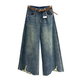 "Tin Denim wide-legged trousers".